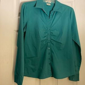Blue-green button-down blouse. Fitted but stretchy.